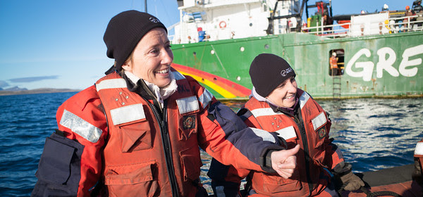 Actor, writer and activist, Emma Thompson (L) and Executive Director of Greenpeace Canada, Joanna Kerr aboard an inflatable boat (RHIB), in front of the Greenpeace ship Arctic Sunrise.  The Arctic Sunrise crew and guests are in Clyde River, Nunavut, to deliver solar panels.