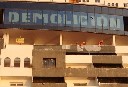 100 activistas de Greenpeace pintan un punto negro de 8.000 m2 en el hotel ilegal de El Algarrobico para exigir su desmantelamiento inmediato