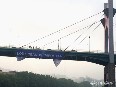 Activistas de Greenpeace despliegan una pancarta de 250 m2 en el puente La Salve de Bilbao para pedir la protección de los océanos 