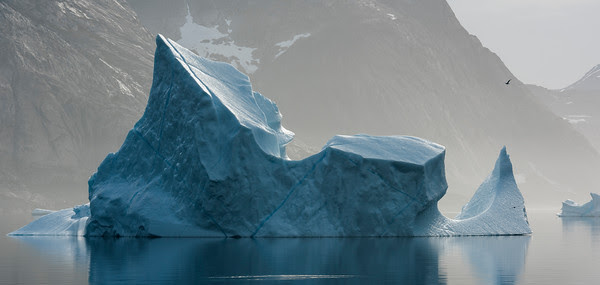 "Iceberg floating at Prince Christian Sound, North Atlantic Sea, Greenland"