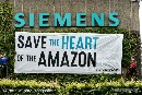 Acciones de Greenpeace en 21 sedes de Siemens para pedirle que no colabore con la destrucción de la Amazonia