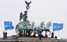 Protesta de Greenpeace en la puerta de Brandenburgo