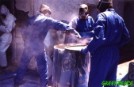 Workers handling highly toxic mercury in